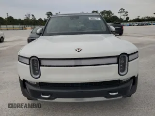 2023 Rivian R1S Adventure z VIN 7PDSGABA3PN024458, wystawiony jako Copart lot #74087714 z przebiegiem 3 505 mil mil oraz Nie do naprawy • Non repairable. Historia ofert i sprzedaży dostępna na DreamBid. Obrazek 5.