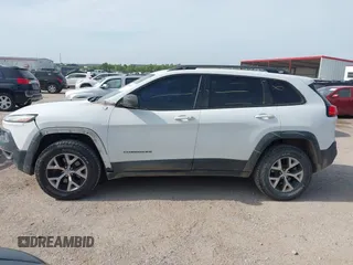 2015 Jeep Cherokee Trailhawk with VIN 1C4PJMBS6FW687718, listed as a IAAI auction lot 42505169 with 122,526 mi miles and . Bid and sale history available at DreamBid. Image 15.