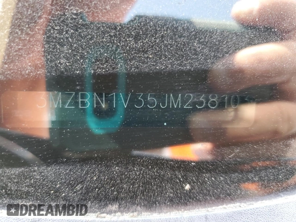 2018 Mazda 3 Touring z VIN 3MZBN1V35JM238103, wystawiony jako Copart lot #56770875 z przebiegiem 66 747 mil mil oraz Szkoda całkowita • Salvage title. Historia ofert i sprzedaży dostępna na DreamBid. Obrazek 13.
