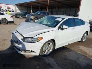 2018 Ford Fusion Hybrid SE with VIN 3FA6P0LU7JR188124, listed as a IAAI auction lot 41760184 with 74,731 mi miles. Bid and sale history available at carsss.com. Image 17.