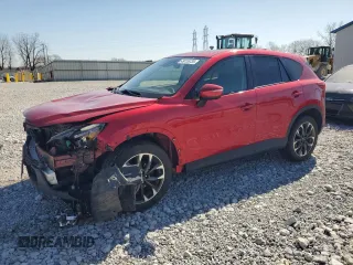 2016 Mazda CX-5 Grand Touring with VIN JM3KE4DY7G0669126, listed as a Copart auction lot 49116735 with 164,785 mi miles and Salvage Title. Bid and sale history available at DreamBid. Image 1.