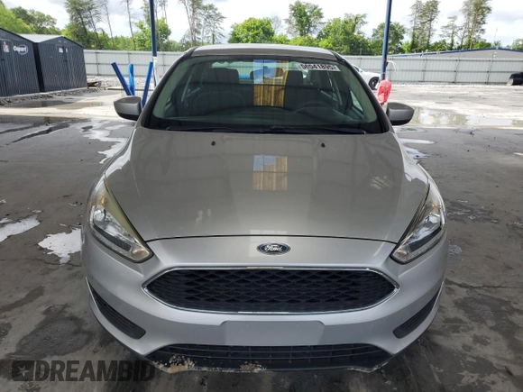 2018 Ford Focus SE z VIN 1FADP3F25JL265168, wystawiony jako Copart lot #56541895 z przebiegiem Nie podano mil oraz Szkoda całkowita • Salvage title. Historia ofert i sprzedaży dostępna na DreamBid. Obrazek 5.