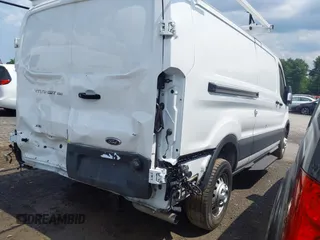 2024 Ford Transit z VIN 1FTYE2Y87RKA82840, wystawiony jako IAAI lot #42644818 z przebiegiem 10 940 mil mil oraz . Historia ofert i sprzedaży dostępna na DreamBid. Obrazek 4.