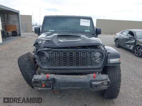 2022 Jeep Wrangler Unlimited Rubicon with VIN 1C4HJXFN2NW134024, listed as a IAAI auction lot 42248188 with 41,899 mi miles and . Bid and sale history available at DreamBid. Image 12.