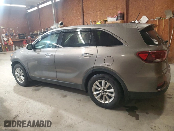2019 Kia Sorento LX z VIN 5XYPGDA58KG487702, wystawiony jako Copart lot #58161275 z przebiegiem 91 928 mil mil oraz Szkoda całkowita • Salvage title. Historia ofert i sprzedaży dostępna na DreamBid. Obrazek 2.
