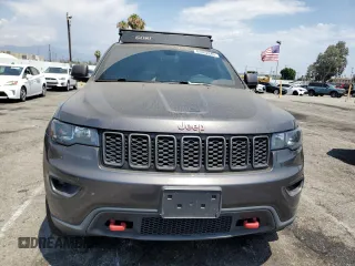 2019 Jeep Grand Cherokee Trailhawk z VIN 1C4RJFLG6KC759527, wystawiony jako Copart lot #64862645 z przebiegiem 76 079 mil mil oraz Szkoda całkowita • Salvage title. Historia ofert i sprzedaży dostępna na DreamBid. Obrazek 5.
