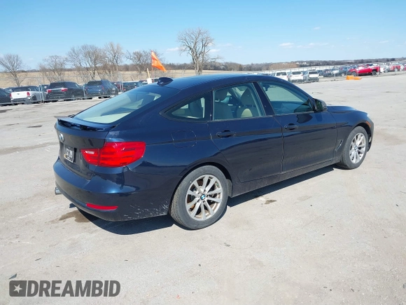 2014 BMW 3 Series 328i Gran Turismo xDrive with VIN WBA3X5C51ED557333, listed as a IAAI auction lot 41879900 with 101,737 mi miles and . Bid and sale history available at DreamBid. Image 4.