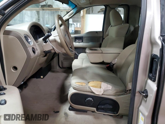 2007 Ford F-150 XL with VIN 1FTRF14WX7KA78665, listed as a Copart auction lot 49962105 with 127,491 mi miles and Salvage title. Bid and sale history available at DreamBid. Image 7.