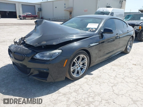 2014 BMW 6 Series 650i with VIN WBA6B2C58ED129026, listed as a IAAI auction lot 41825916 with 109,264 mi miles and . Bid and sale history available at carsss.com. Image 18.