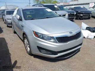 2012 Kia Optima LX with VIN KNAGM4A70C5280464, listed as a IAAI auction lot 41881578 with 141,494 mi miles. Bid and sale history available at carsss.com. Image 1.