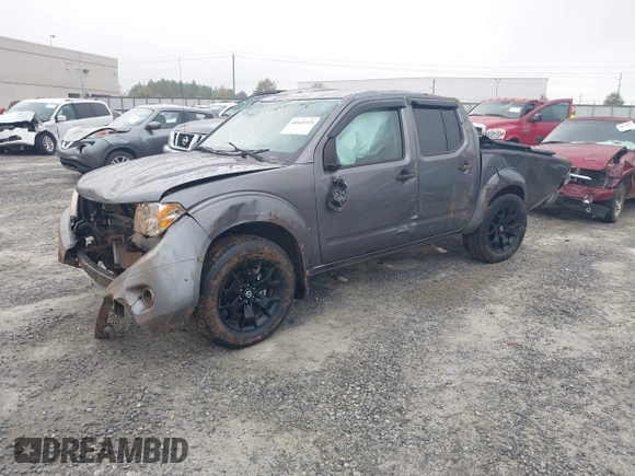 2021 Nissan Frontier SV z VIN 1N6ED0EA6MN713258, wystawiony jako IAAI lot #40820539 z przebiegiem 86 364 mil mil oraz . Historia ofert i sprzedaży dostępna na DreamBid. Obrazek 2.