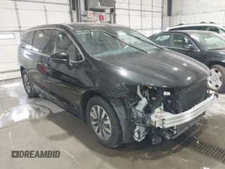 2023 Chrysler Pacifica Hybrid Touring L with VIN 2C4RC1L79PR626451, listed as a IAAI auction lot 41933879 with 37,448 mi miles and . Bid and sale history available at DreamBid. Image 1.