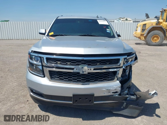 2015 Chevrolet Tahoe LT with VIN 1GNSCBKC6FR303850, listed as a IAAI auction lot 42254115 with 147,856 mi miles and . Bid and sale history available at DreamBid. Image 12.