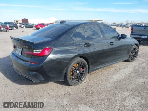 2022 BMW 3 Series M340i xDrive with VIN WBA5U9C08NFM68599, listed as a IAAI auction lot 41260340 with Not Provided miles and . Bid and sale history available at DreamBid. Image 4.
