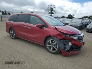 2022 Honda Odyssey Touring with VIN 5FNRL6H85NB067178, listed as a Copart auction lot 56577315 with 22,184 mi miles and Salvage title. Bid and sale history available at DreamBid. Image 4.