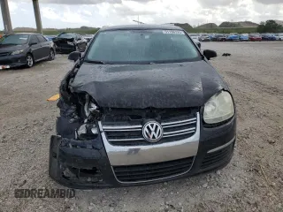 2009 Volkswagen Jetta S z VIN 3VWJM71K49M094862, wystawiony jako Copart lot #51166725 z przebiegiem 121 849 mil mil oraz Szkoda całkowita • Salvage title. Historia ofert i sprzedaży dostępna na DreamBid. Obrazek 5.