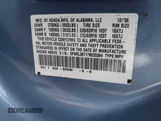 2007 Honda Odyssey EX-L z VIN 5FNRL38717B035384, wystawiony jako IAAI lot #41976861 z przebiegiem 211 640 mil mil oraz . Historia ofert i sprzedaży dostępna na DreamBid. Obrazek 9.