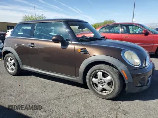 2011 MINI Hardtop with VIN WMWSU3C55BT094204, listed as a Copart auction lot 53994195 with 132,938 mi miles and Clean Title. Bid and sale history available at DreamBid. Image 4.