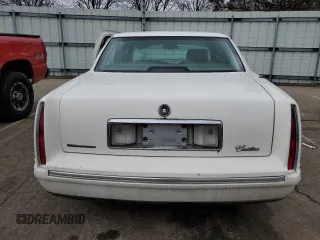 1998 Cadillac DeVille with VIN 1G6KD54Y7WU755628, listed as a Copart auction lot 45166875 with 165,385 mi miles and Salvage Title. Bid and sale history available at carsss.com. Image 6.