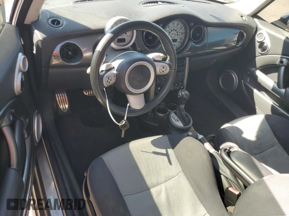 2006 MINI Hardtop S with VIN WMWRE33596TJ33149, listed as a Copart auction lot 43462805 with Not Provided miles and Salvage Title. Bid and sale history available at DreamBid. Image 8.