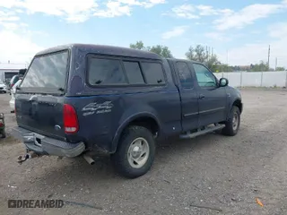 2000 Ford F-150 XL with VIN 1FTRX18L6YNB68229, listed as a IAAI auction lot 40141907 with 1 mi miles. Bid and sale history available at carsss.com. Image 4.