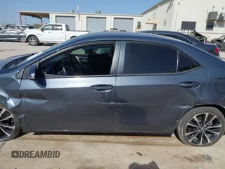 2019 Toyota Corolla L with VIN 5YFBURHE9KP910059, listed as a IAAI auction lot 41856905 with 104,096 mi miles and . Bid and sale history available at DreamBid. Image 14.