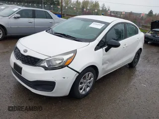 2012 Kia Rio LX with VIN KNADM4A33C6072511, listed as a IAAI auction lot 41993919 with 140,965 mi miles. Bid and sale history available at carsss.com. Image 2.