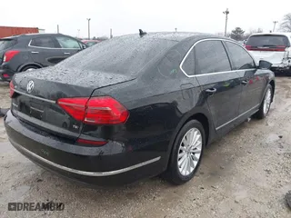 2016 Volkswagen Passat 1.8T SE w/Technology with VIN 1VWBS7A37GC069617, listed as a IAAI auction lot 41680890 with 139,457 mi miles. Bid and sale history available at carsss.com. Image 4.