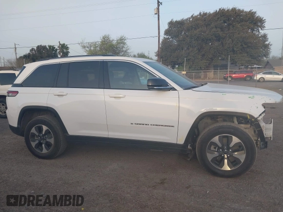 2022 Jeep Grand Cherokee with VIN 1C4RJYB63N8762798, listed as a IAAI auction lot 41723969 with 23,853 mi miles and . Bid and sale history available at DreamBid. Image 14.