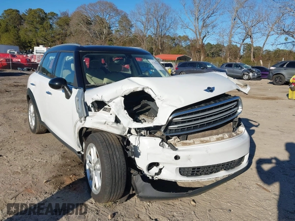 2015 MINI Countryman z VIN WMWZB3C53FWR43884, wystawiony jako IAAI lot #41296213 z przebiegiem 111 934 mil mil oraz . Historia ofert i sprzedaży dostępna na DreamBid. Obrazek 6.