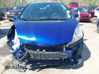 2010 Honda Fit Sport with VIN JHMGE8H4XAS018807, listed as a IAAI auction lot 41990369 with 63,151 mi miles. Bid and sale history available at carsss.com. Image 6.