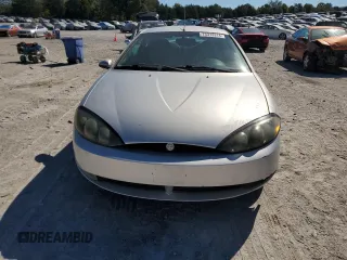 2000 Mercury Cougar z VIN 1ZWFT61L4Y5641222, wystawiony jako Copart lot #75313314 z przebiegiem 138 909 mil mil oraz Szkody całkowita. Historia ofert i sprzedaży dostępna na DreamBid. Obrazek 5.