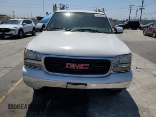 2005 GMC Yukon SLT z VIN 1GKEC13V65J174655, wystawiony jako Copart lot #59050755 z przebiegiem 93 893 mil mil oraz Czysty tytuł • Clean title. Historia ofert i sprzedaży dostępna na DreamBid. Obrazek 5.