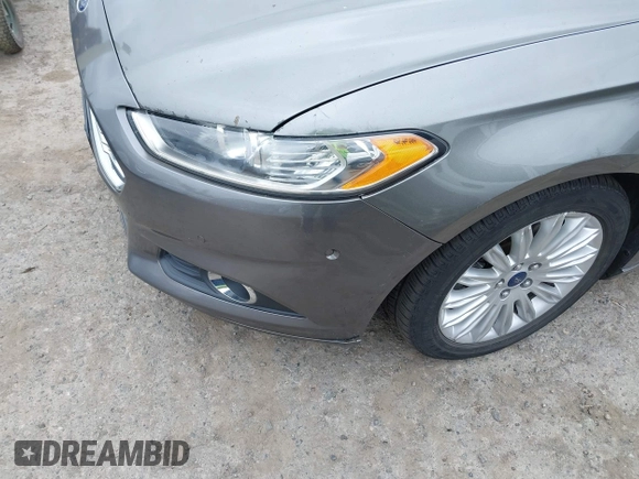 2014 Ford Fusion SE Hybrid with VIN 3FA6P0LU6ER285188, listed as a IAAI auction lot 42516215 with 122,899 mi miles and . Bid and sale history available at DreamBid. Image 6.