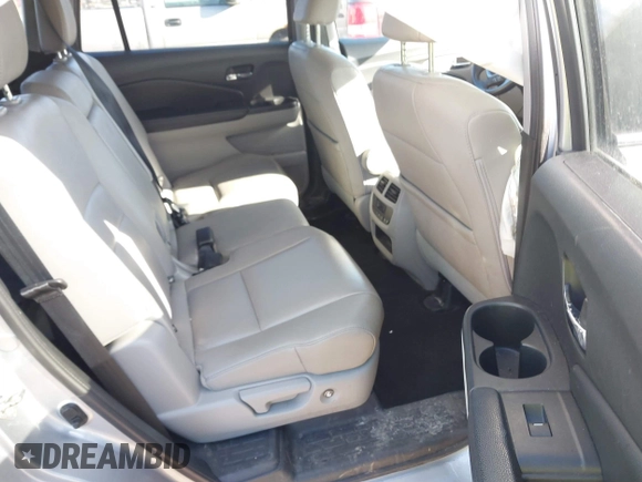2017 Honda Pilot EX-L with VIN 5FNYF6H50HB059096, listed as a IAAI auction lot 41757214 with 165,651 mi miles and . Bid and sale history available at DreamBid. Image 8.