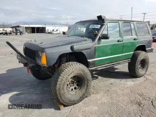 1988 Jeep Grand Cherokee with VIN 1JCMT7843JT077811, listed as a Copart auction lot 86964334 with 97,571 mi miles and Clean title. Bid and sale history available at DreamBid. Image 1.