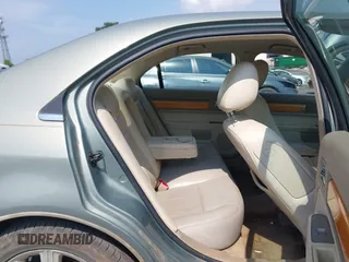 2009 Lincoln MKZ with VIN 3LNHM26T69R605122, listed as a IAAI auction lot 42580220 with 168,000 mi miles and . Bid and sale history available at DreamBid. Image 8.