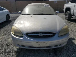 2002 Ford Taurus SE with VIN 1FAFP53272G198088, listed as a Copart auction lot 69810014 with 152,794 mi miles and Clean title. Bid and sale history available at DreamBid. Image 5.