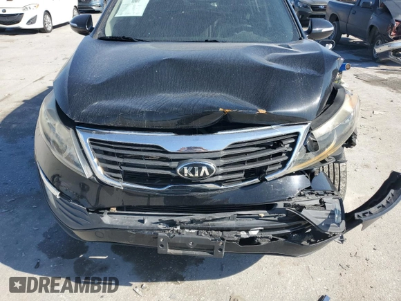 2013 Kia Sportage EX z VIN KNDPC3A24D7474943, wystawiony jako Copart lot #43266565 z przebiegiem 85 017 mil mil oraz Szkoda całkowita • Salvage title. Historia ofert i sprzedaży dostępna na DreamBid. Obrazek 12.