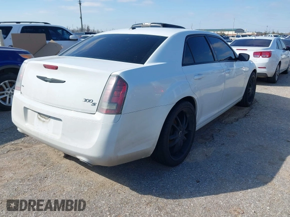 2014 Chrysler 300 with VIN 2C3CCAGG1EH375447, listed as a IAAI auction lot 41604083 with 180,286 mi miles. Bid and sale history available at carsss.com. Image 4.