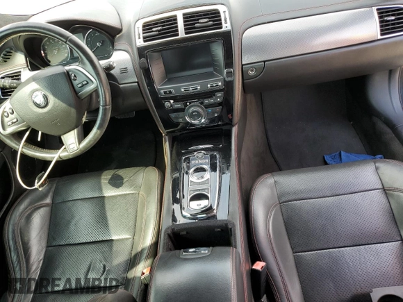 2015 Jaguar XK with VIN SAJWA4EC3FMB56203, listed as a Copart auction lot 74568194 with 0 mi miles and Non Repairable. Bid and sale history available at carsss.com. Image 8.