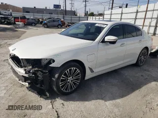 2020 BMW 5 Series 530e with VIN WBAJA9C0XLCD71591, listed as a Copart auction lot 79766234 with 115,358 mi miles and Salvage Title. Bid and sale history available at carsss.com. Image 1.