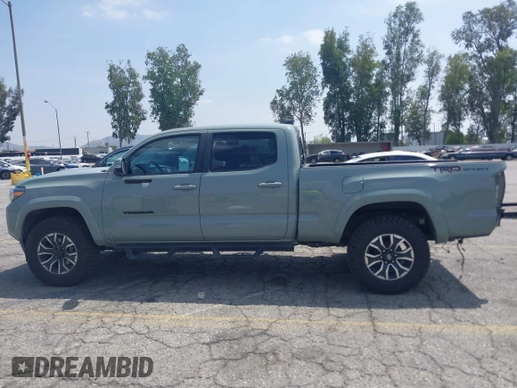 2022 Toyota Tacoma SR5 with VIN 3TMBZ5DN1NM035572, listed as a IAAI auction lot 42083925 with 82,596 mi miles and . Bid and sale history available at DreamBid. Image 15.