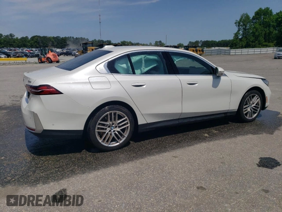 2024 BMW 5 Series 530i z VIN WBA43FJ00RCR49504, wystawiony jako Copart lot #57427265 z przebiegiem 30 326 mil mil oraz Szkoda całkowita • Salvage title. Historia ofert i sprzedaży dostępna na DreamBid. Obrazek 3.