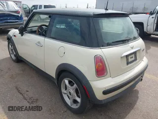 2004 MINI Hardtop with VIN WMWRC334X4TJ56384, listed as a IAAI auction lot 42581423 with 79,129 mi miles and . Bid and sale history available at DreamBid. Image 3.