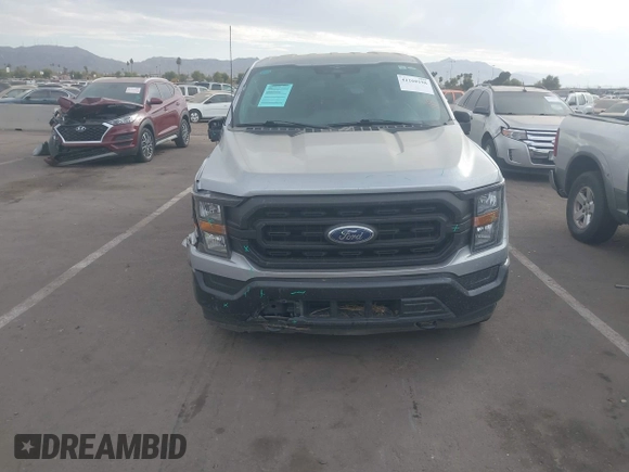 2023 Ford F-150 XL with VIN 1FTFW1ED9PFA89505, listed as a IAAI auction lot 41260198 with 56,805 mi miles. Bid and sale history available at carsss.com. Image 12.