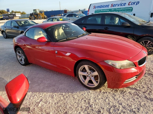 2010 BMW Z4 sDrive30i with VIN WBALM5C55AE377253, listed as a Copart auction lot 74230184 with 0 mi miles and Salvage Title. Bid and sale history available at carsss.com. Image 4.