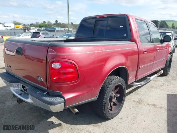2001 Ford F-150 SuperCrew XLT with VIN 1FTRW07L71KD64069, listed as a IAAI auction lot 41914660 with 1 mi miles. Bid and sale history available at carsss.com. Image 4.