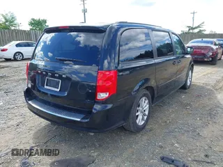 2013 Dodge Grand Caravan SXT with VIN 2C4RDGCG9DR563072, listed as a IAAI auction lot 42179166 with 211,008 mi miles and . Bid and sale history available at DreamBid. Image 4.