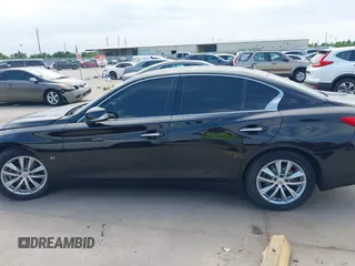 2015 Infiniti Q50 Premium with VIN JN1BV7AP1FM342558, listed as a IAAI auction lot 41975803 with 140,603 mi miles. Bid and sale history available at carsss.com. Image 14.
